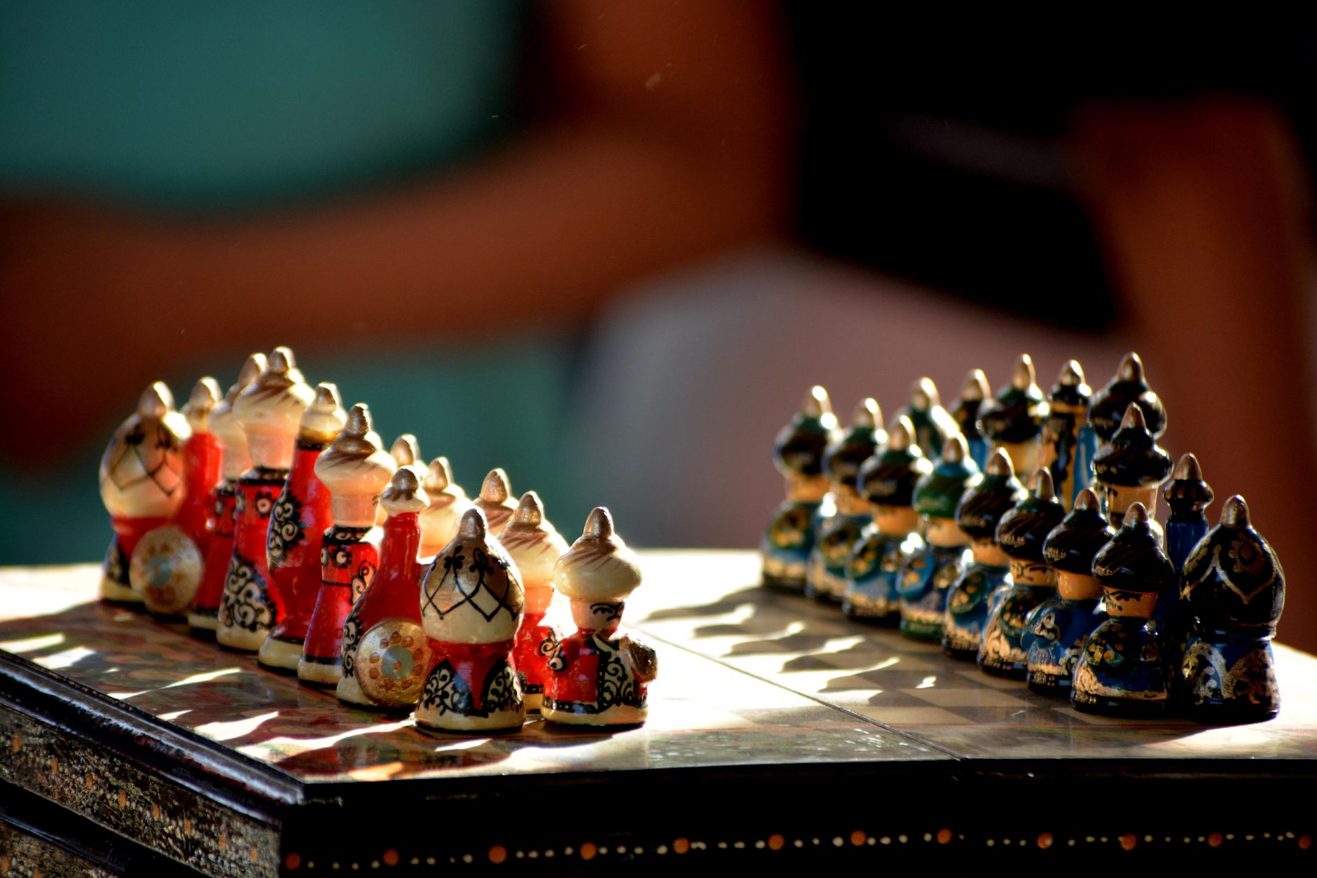 A beautifully crafted chess set displayed at an Indian craft fair, showcasing cultural artistry.