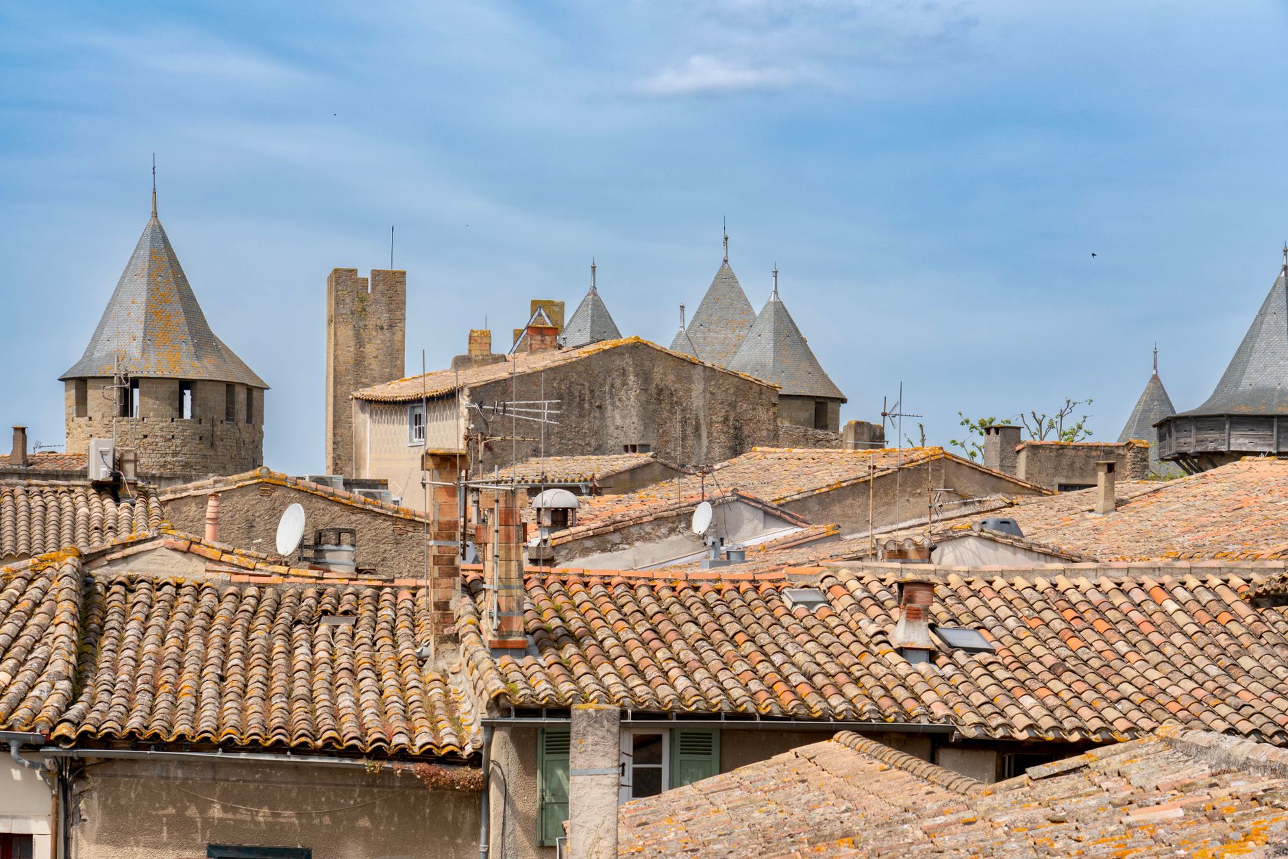A scenic view of the historical rooftops of Carcassonne, France, showcasing medieval architecture.